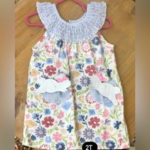 2T floral dress with bunnies on the pockets.